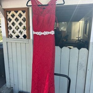 Elegant Red Lace Dress with Embellished Waist